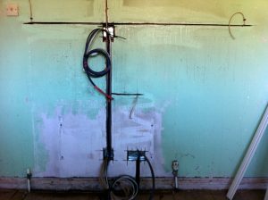 custom pre-wiring cable chase in brick